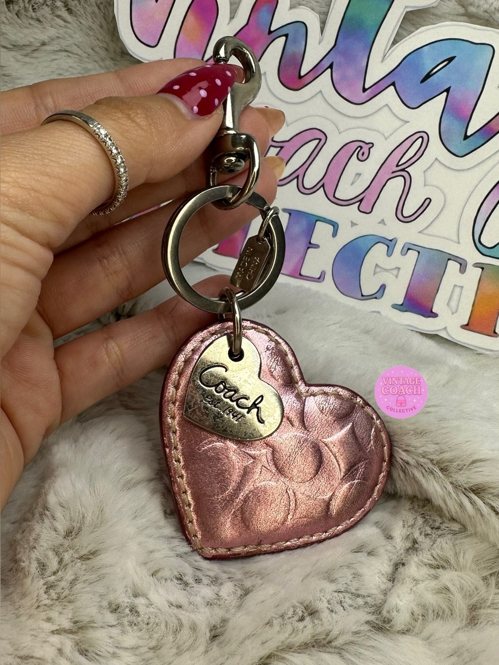Coach heart charm
